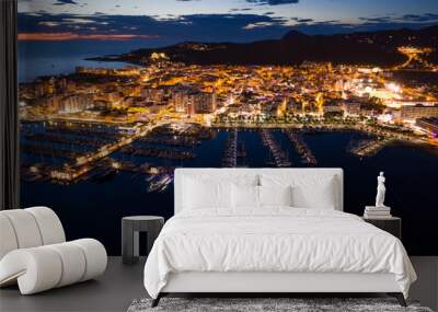 Aerial view of city port at night. Wall mural