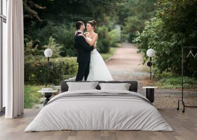 Beautiful wedding couple posing Wall mural