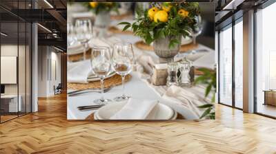 Festive table at the wedding party decorated with lemon arrangements Wall mural