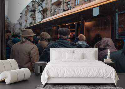 Many unidentified people are waiting for city transport at the bus stop Wall mural