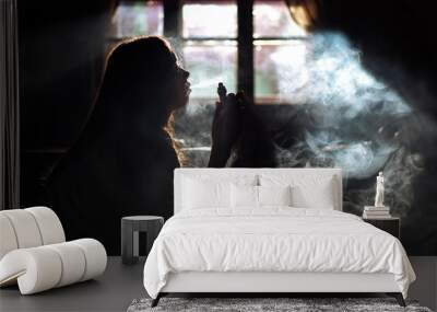 The girl smoke electronic cigarette Wall mural