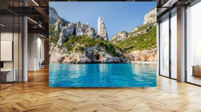 The monolith of Pedra Longa, Baunei, province of Ogliastra, East Sardinia, Italy. The rocky spire which rises majestically out of the sea. Holidays in Sardinia. Wall mural