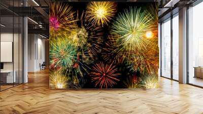 Colorful fireworks over dark sky Wall mural