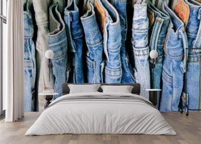 A rack of second hand jeans Wall mural