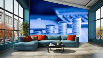 stacks of money coin with calculator, Business and financial investment concept.  Wall mural