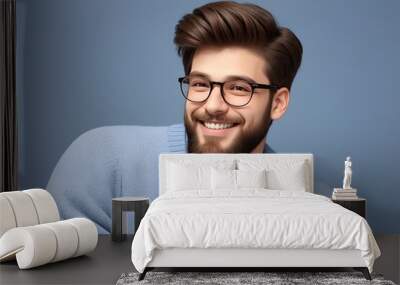 Confident and Stylish: A young man with a beard and glasses smiles warmly, showcasing a youthful, approachable, and confident aura.  His casual yet stylish attire and relaxed posture exude an air of e Wall mural