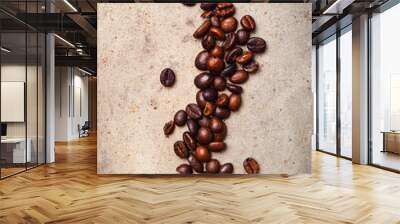 Whole Coffee beans on textured rusty background. Flat lay Wall mural