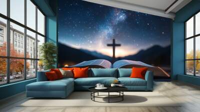 A serene scene featuring an open book under a starry sky with a cross in the background, evoking a sense of faith and wonder. Wall mural