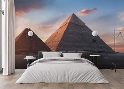 Stunning view of ancient pyramids at sunset, showcasing natural beauty and historical significance in a breathtaking landscape. Wall mural