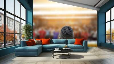 Microphone over the Abstract blurred photo of conference hall or seminar room with attendee background,Small Business training concept,Public speaking Wall mural