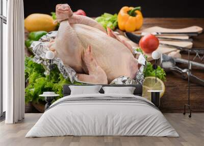 Raw chicken with ingredient uncooked in kitchen. Wall mural