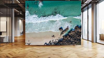 An aerial shot of two surfers waiting for a wave at Torpedo Rocks in Yallingup, WA Wall mural