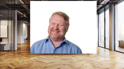 Friendly middle aged bearded guy in blue shirt - on white Wall mural