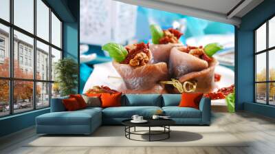 appetizer of herring rolls with dried tomato and walnuts for chr Wall mural