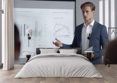 a young man in a business suit shows a presentation
 Wall mural