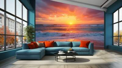 A beautiful sunset over the ocean with a few clouds in the sky Wall mural