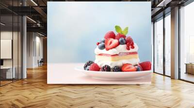 a cake with strawberries, blueberries, and raspberries on top Wall mural