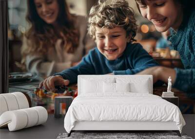 A family of four is playing a board game together Wall mural