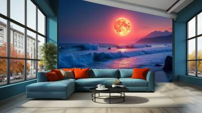 A large red moon is in the sky above a beach Wall mural