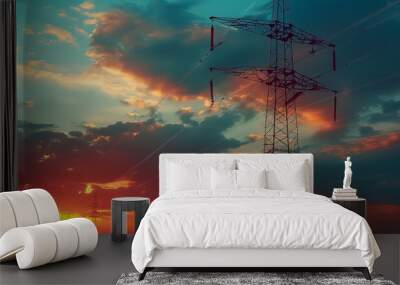 A power line tower is silhouetted against a beautiful sunset Wall mural