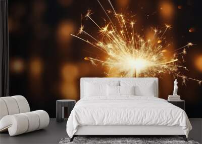 A sparkler on a ryzwashed background during a diwali in India Wall mural