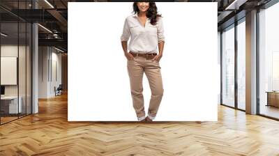 A woman is wearing a tan shirt and tan pants Wall mural