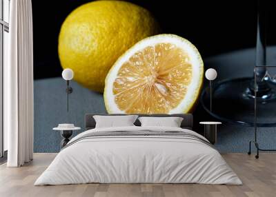 two fresh yellow lemon on a grey background Wall mural