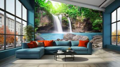 Travel to the beautiful waterfall in deep forest, soft water of the stream in the natural park at Haew Suwat Waterfall at Khao Yai National Park, Thailand Wall mural