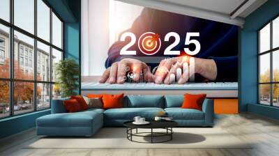 2025 business trend, market growth and technology concept. 2025 calendar number with AI assistance support tools, digital marketing data, strategy icons appear while businessman working with computer. Wall mural