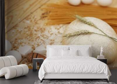 Yeast dough, home baking, on the table, top view, free space, place for text, wooden background Wall mural