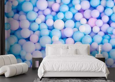 Colorful balls background in pink and blue colors. Background with colorful balls in different sizes. Sphere of balls on pastel color. Wall mural