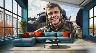 Portrait of a male equipped soldier in military uniform with weapon Wall mural