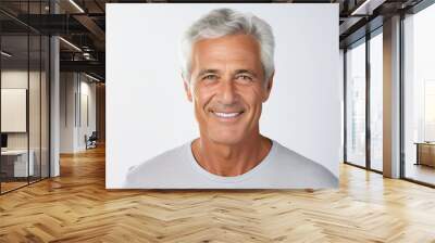 Portrait of handsome man with bright smile veneers after dentist isolated on white background Wall mural