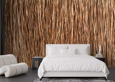 Thatched roof or wall background. Tropical roofing on beach Wall mural