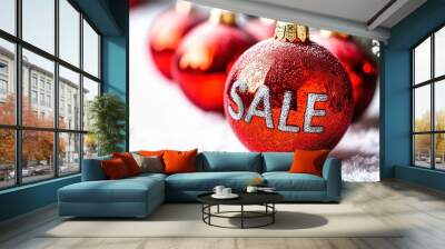 Two red christmas ornaments saying sale announcing christmas sale season Wall mural