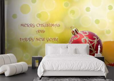 Christmas card. Christmas balls and ribbons with text Wall mural