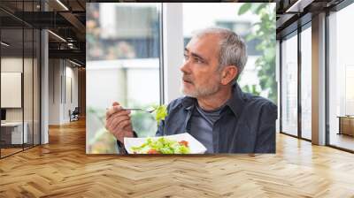 man with vegan food, diet and eating concept Wall mural