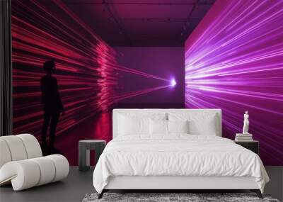 a person standing in front of a wall with light streaks Wall mural