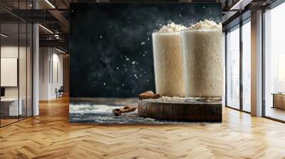 two glasses of milk with cinnamons and cinnamons Wall mural