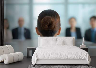 A businesswoman with a bun faces a corporate board meeting. Blurred background shows board members in a conference room. Wall mural