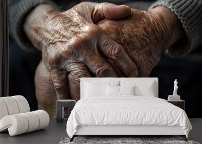 Close-up of an older man's knee, swollen and showing severe pain. Wall mural