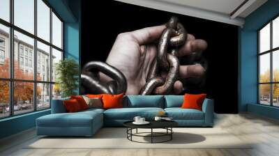 victim, slave, prosoner male hands tied by big metal chain by him self. People have no freedom concept image. Wall mural