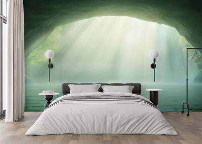 A cave with a stream of water running through it Wall mural