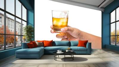 Hand holding a glass of whiskey on the rocks Wall mural