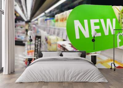 New word signage on supermarket shelf for new product arrival Wall mural