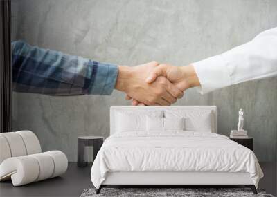 Business partnership meeting concept. Image business man handshake. Successful businessmen handshaking after good deal. Horizontal, on white background Wall mural