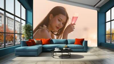 A beautiful woman drinking wine before sunset, Woman drinking wine, Sad woman sitting on a boat in the ocean, A beautiful woman feeling sad and drinking wine Wall mural