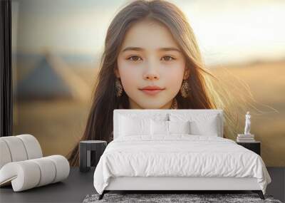 A serene portrait of a young girl in nature, showcasing beauty and tranquility in golden sunlight with a gentle breeze. Wall mural