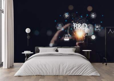 Research and development, businessman holding light bulb with R and D icons on virtual screen for research and development, technology, science, business Wall mural