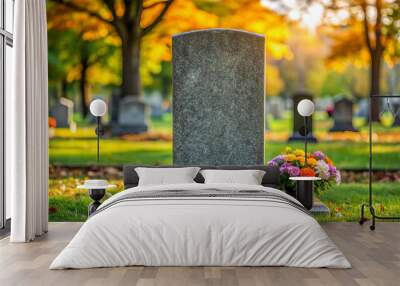 Blank Gravestone with Flowers in a Cemetery. Wall mural